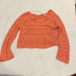 Free People cropped coral sweater.